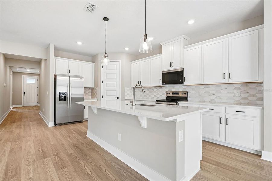 Furnished interior view inside a new home in Legends Preserve - Signature Series, Daytona Beach (Image 17).