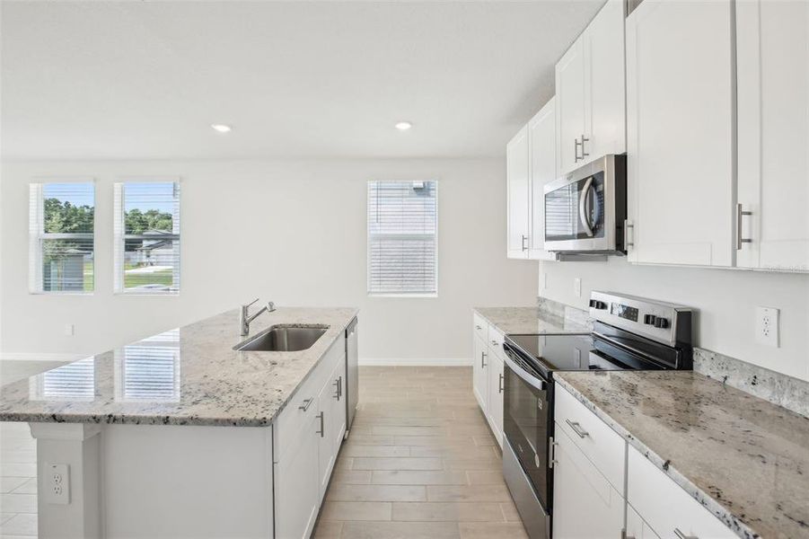 Furnished interior view inside a new home in Benton Hills - Classic Series, Brooksville (Image 3). Furnished interior view inside a new home in Benton Hills - Classic Series, Brooksville (Image 3).