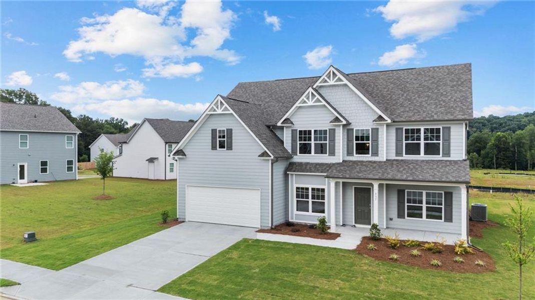 Front exterior of a new home in Hampton Ridge, Jefferson, GA, highlighting curb appeal (Image 1). Front exterior of a new home in Hampton Ridge, Jefferson, GA, highlighting curb appeal (Image 1).