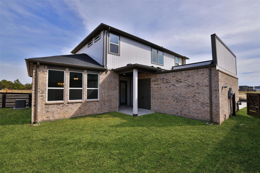 Exterior details and patio area of a home in Bridgeland Central, Cypress (Image 24).