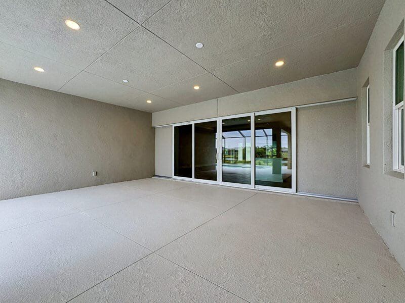 Exterior details and patio area of a home in River Preserve Estates, Parrish (Image 3).