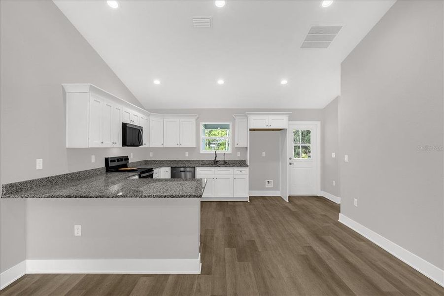 Furnished interior view inside a new home in , Dunnellon (Image 10).