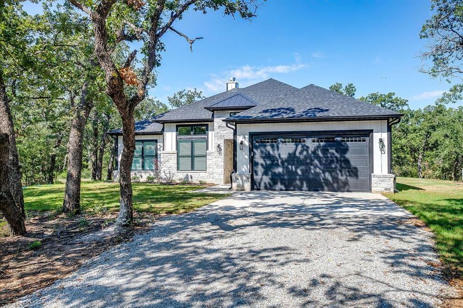 Front exterior of a new home in , Bridgeport, TX, highlighting curb appeal (Image 25).