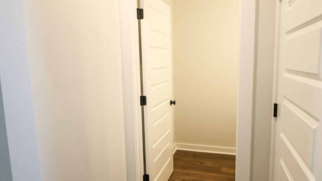 Representative unfurnished interior of a home built from the STONEBROOK II by D.R. Horton in Harvest Point, Spring Hill (Image 29).