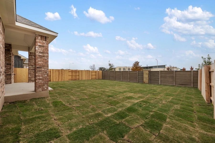 Exterior details and patio area of a home in Berry Creek Highlands, Georgetown (Image 26).
