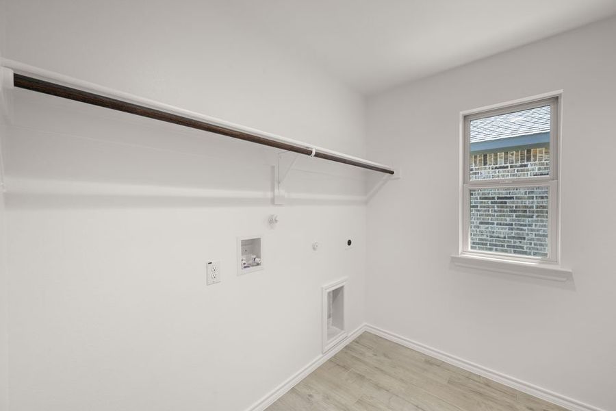 Representative exterior photo of a completed home built from the Austin by Impression Homes in Baker Farms, Cleburne, TX (Image 21).