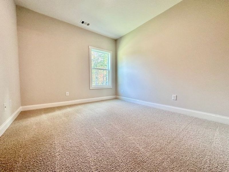 Spacious, unfurnished interior of a new home in Deer Creek, Moreland (Image 11).