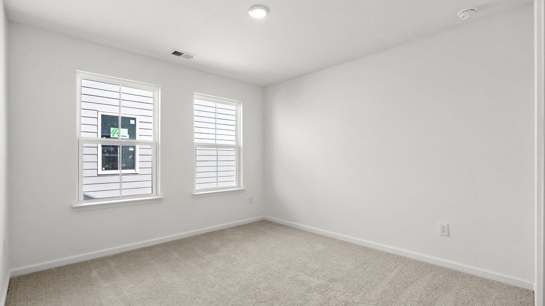 Furnished interior view inside a new home in Indigo at the Preserve, Longs (Image 18).