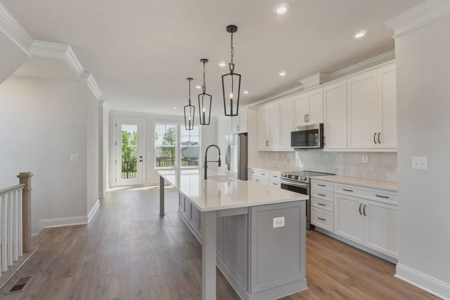 Furnished interior in a model home at Sherron Road Townes in Durham (Image 20).