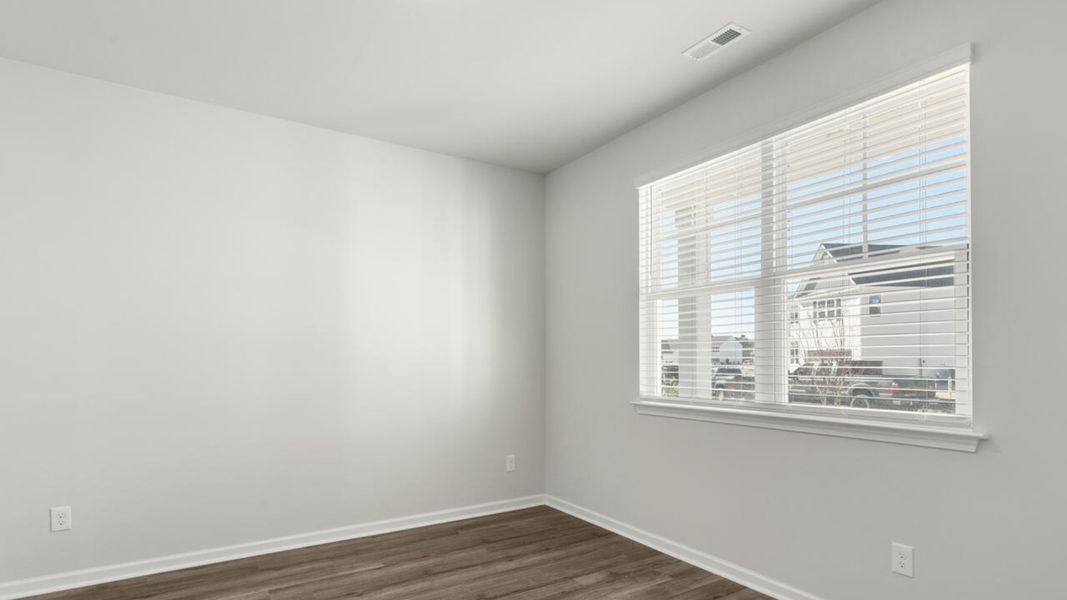 Representative unfurnished interior of a home built from the TILLMAN by D.R. Horton in Surfside Landing, Hubert (Image 20).