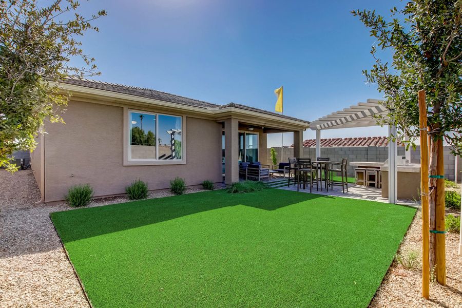 Front exterior of a new home in Castillo at Anderson Parc, Buckeye, AZ, highlighting curb appeal (Image 1). Front exterior of a new home in Castillo at Anderson Parc, Buckeye, AZ, highlighting curb appeal (Image 1).