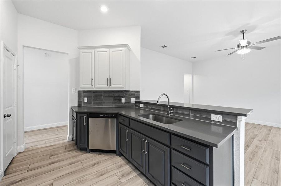 Open Concept Kitchen overlooking living room space Open Concept Kitchen overlooking living room space
