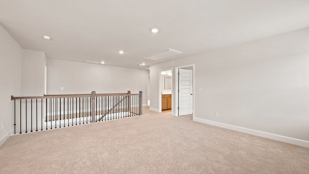 Representative unfurnished interior of a home built from the Emerson by D.R. Horton in Evergreen Crossing, Locust Grove (Image 24).