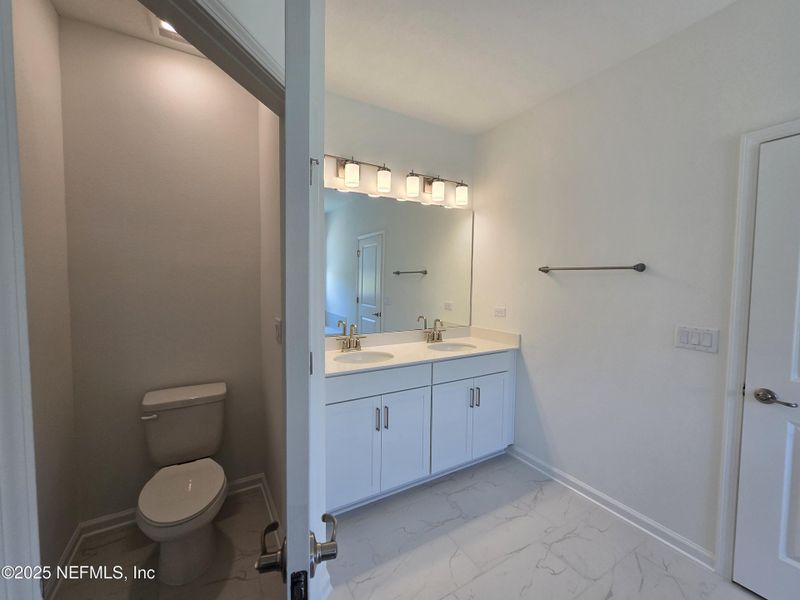 Furnished interior view inside a new home in Hyland Trail, Green Cove Springs (Image 5). Furnished interior view inside a new home in Hyland Trail, Green Cove Springs (Image 5).