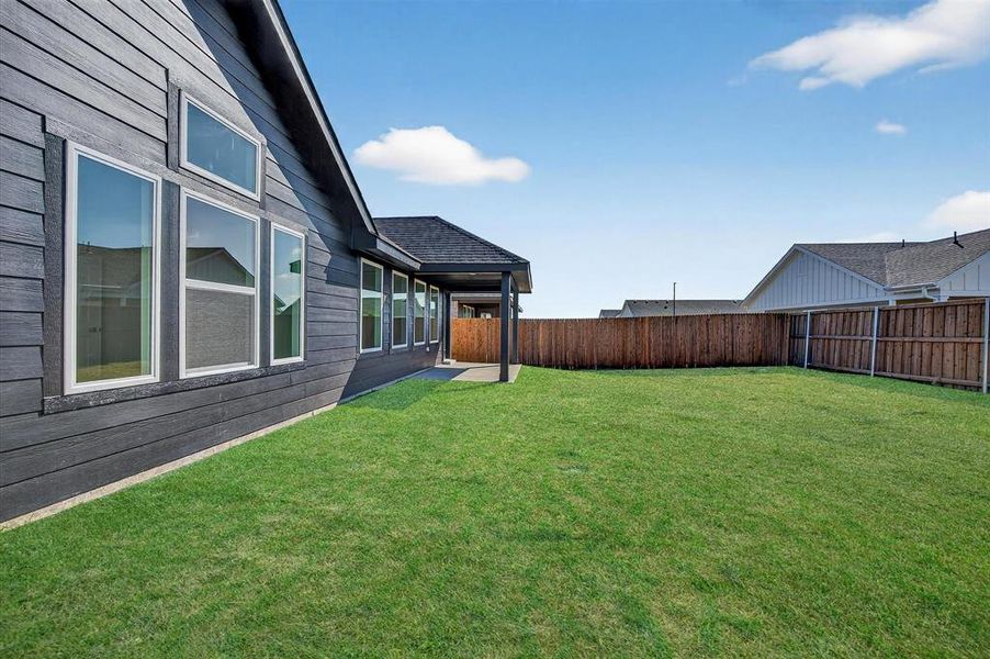 Exterior details and patio area of a home in Hickory Hill, Sherman (Image 4). Exterior details and patio area of a home in Hickory Hill, Sherman (Image 4).