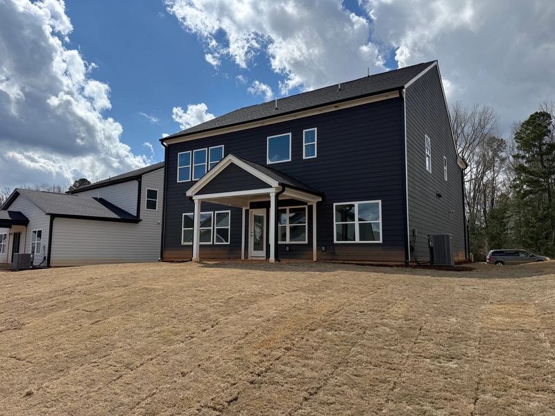 Exterior details and patio area of a home in Rowland's Grant, Fuquay Varina (Image 7).