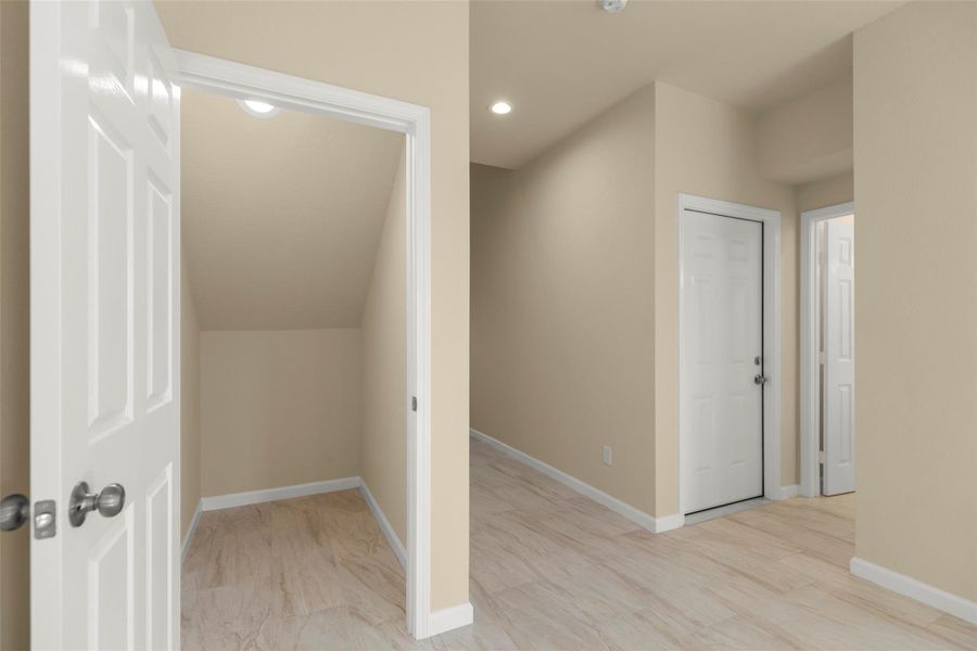 Modern kitchen with white cabinets, stainless steel appliances, and tile backsplash. Open layout with light flooring and recessed lighting. Modern kitchen with white cabinets, stainless steel appliances, and tile backsplash. Open layout with light flooring and recessed lighting.