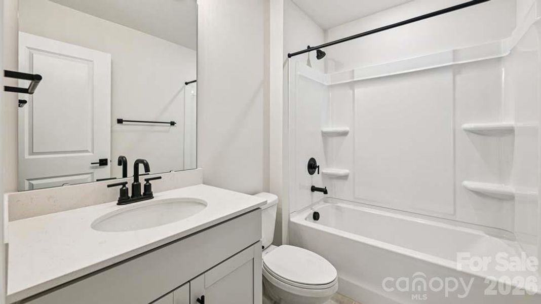 Furnished interior view inside a new home in Sylvan Creek, Denver (Image 8).