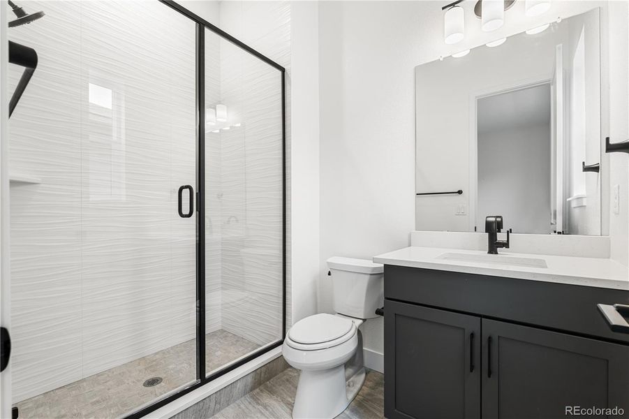 Furnished interior view inside a new home in Reflection at Solstice, Littleton (Image 27).