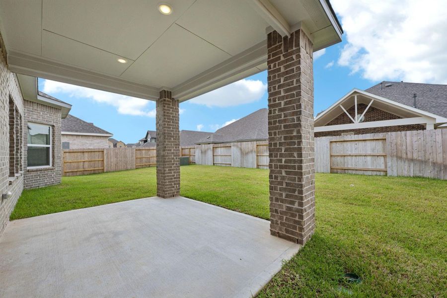 Exterior details and patio area of a home in Kingdom Heights, Rosenberg (Image 2). Exterior details and patio area of a home in Kingdom Heights, Rosenberg (Image 2).