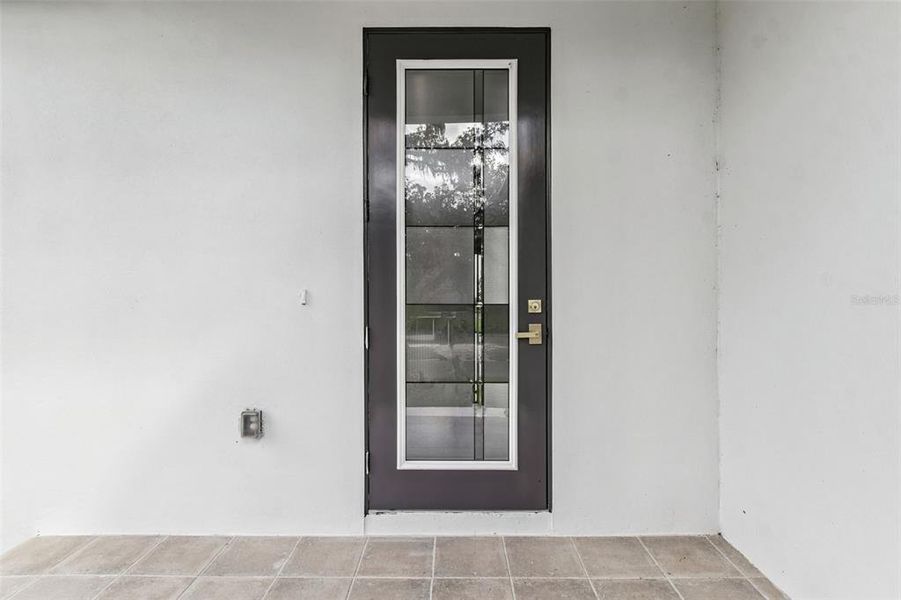 Exterior details and patio area of a home in , Brooksville (Image 3).