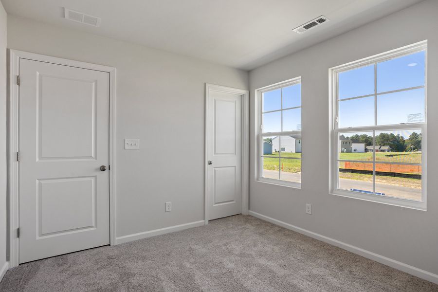 Spacious, unfurnished interior of a new home in Cambridge Reserve, Angier (Image 30). Spacious, unfurnished interior of a new home in Cambridge Reserve, Angier (Image 30).
