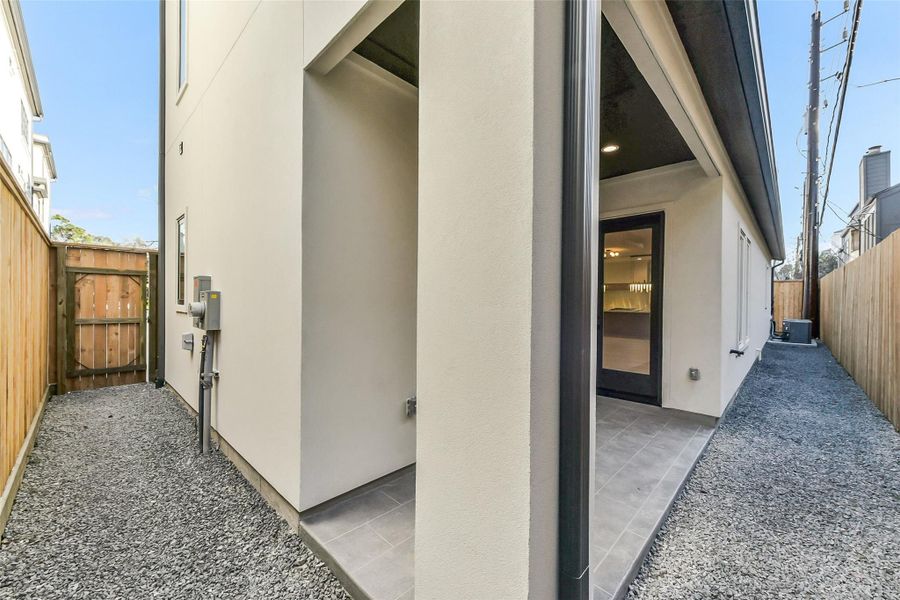 Exterior details and patio area of a home in , Houston (Image 26). Exterior details and patio area of a home in , Houston (Image 26).