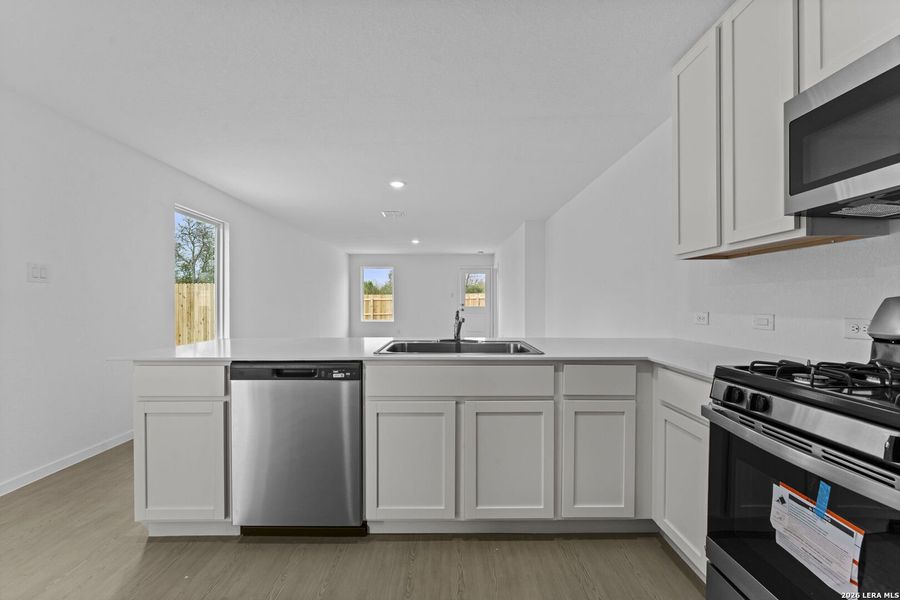 Furnished interior view inside a new home in Torian Village, San Antonio (Image 6).