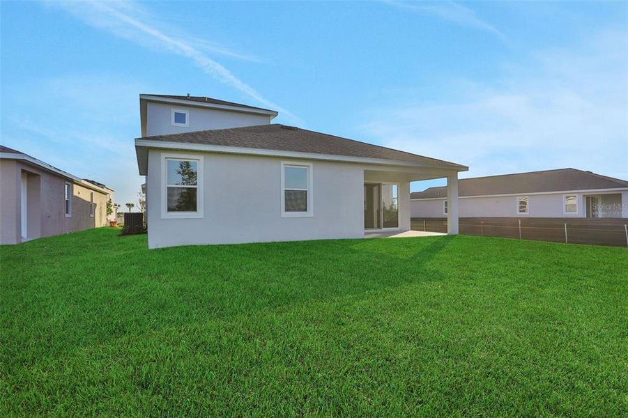 Exterior details and patio area of a home in Turnleaf, Punta Gorda (Image 4).