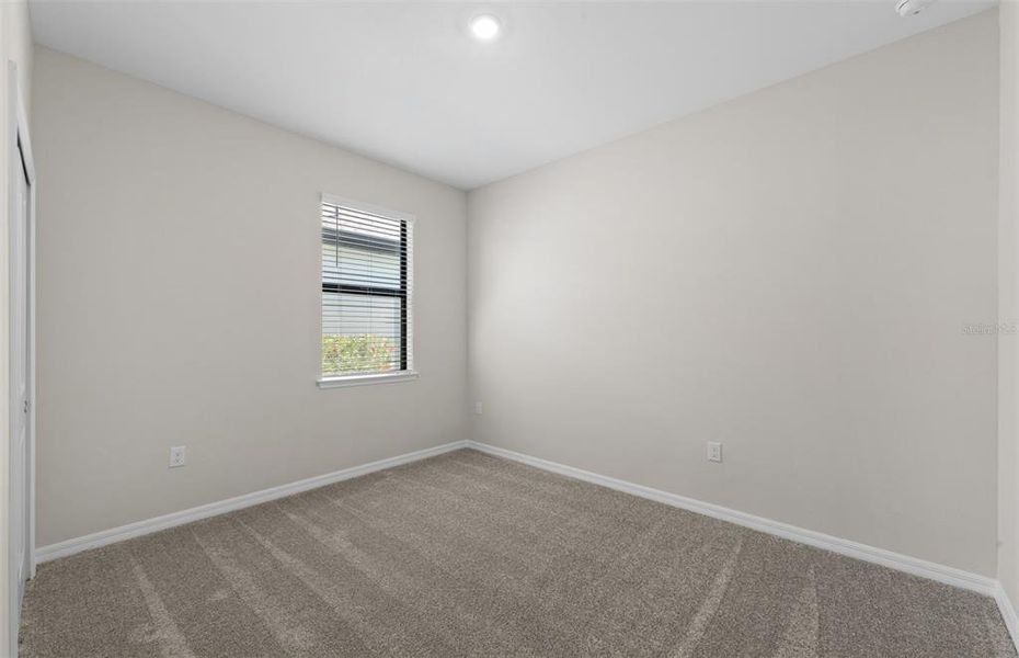 Spacious, unfurnished interior of a new home in The Strand at Cedar Grove, North Port (Image 19).