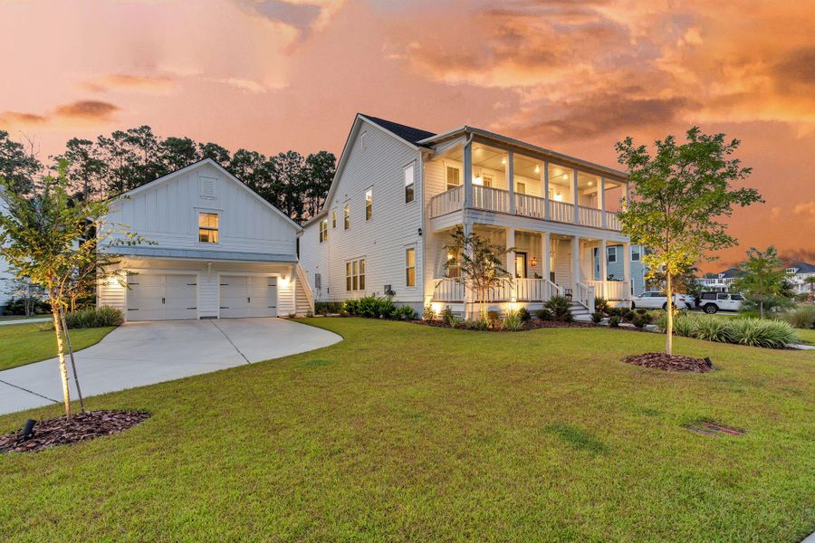 Front exterior of a new home in Carolina Park: Riverside, Mount Pleasant, SC, highlighting curb appeal (Image 29). Front exterior of a new home in Carolina Park: Riverside, Mount Pleasant, SC, highlighting curb appeal (Image 29).