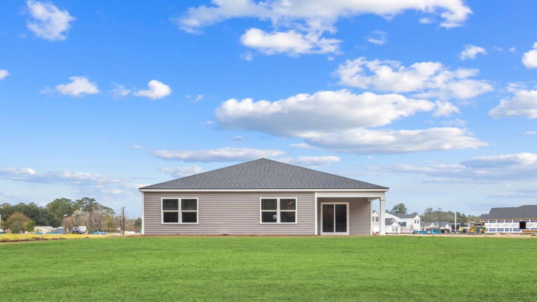 Exterior details and patio area of a home in The Groves at Bees Creek, Ridgeland (Image 3).