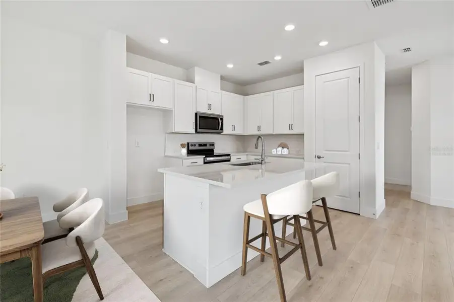 Furnished interior view inside a new home in North River Ranch – Townhomes, Parrish (Image 6).