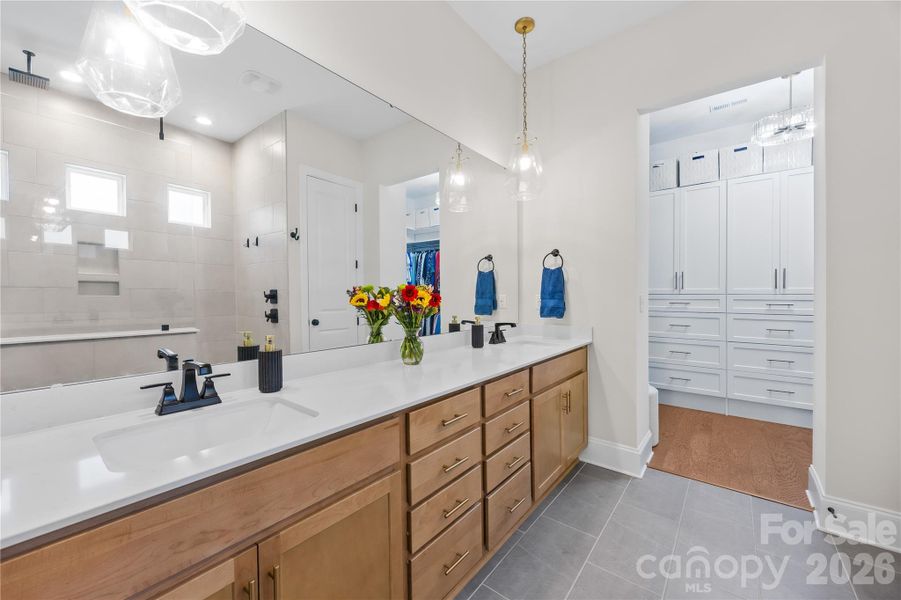 Primary Bathroom with Large Dual Vanity and Custom Walk-In Closet Primary Bathroom with Large Dual Vanity and Custom Walk-In Closet