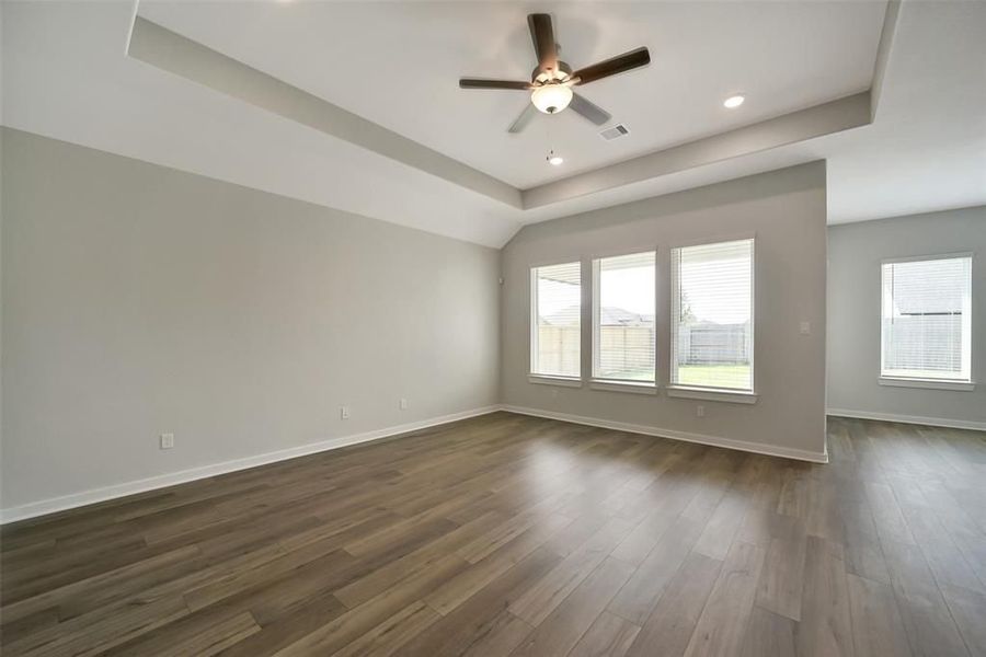 Spacious, unfurnished interior of a new home in Sunterra, Katy (Image 28).