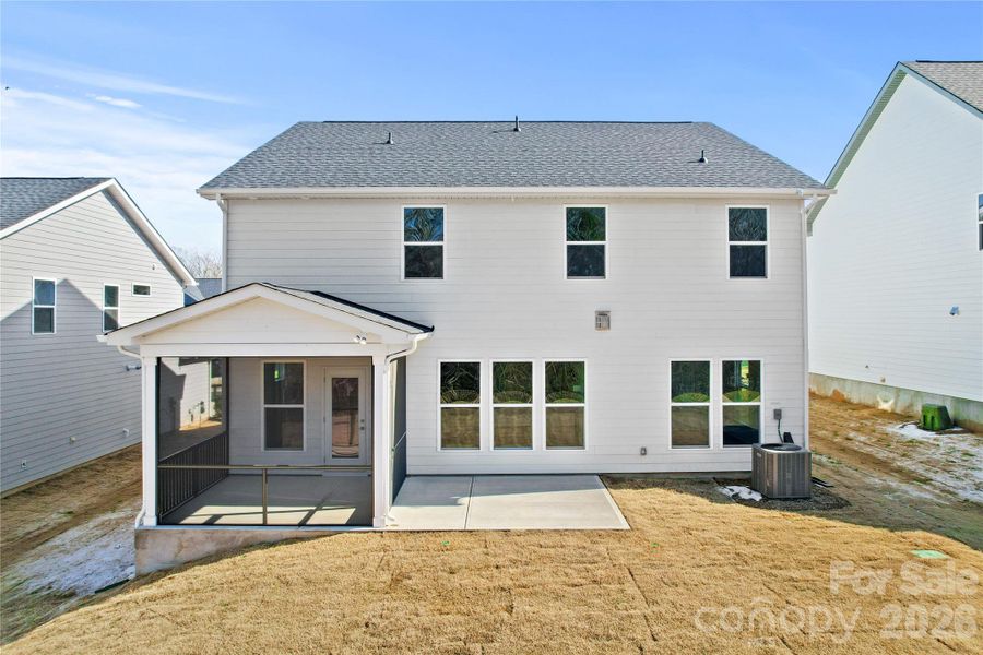 Exterior details and patio area of a home in Forest Creek, Waxhaw (Image 27).