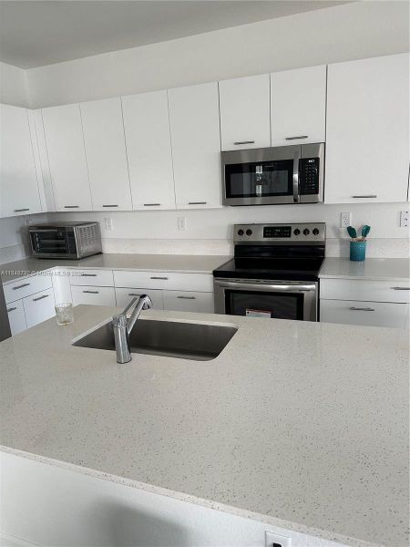 Furnished interior view inside a new home in , Miami (Image 7). Furnished interior view inside a new home in , Miami (Image 7).