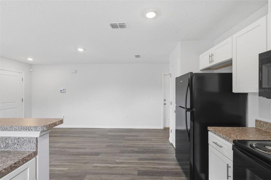 Furnished interior view inside a new home in , Apopka (Image 7).
