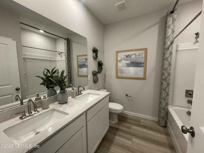 Furnished interior view inside a new home in The Magnolia Series at Reserve East, Flagler Beach (Image 11). Furnished interior view inside a new home in The Magnolia Series at Reserve East, Flagler Beach (Image 11).