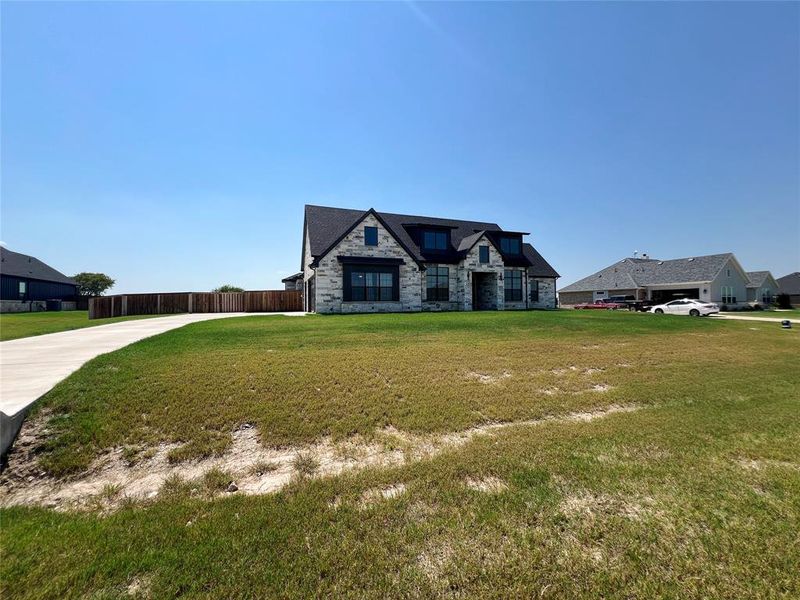 View of front of home featuring stone siding