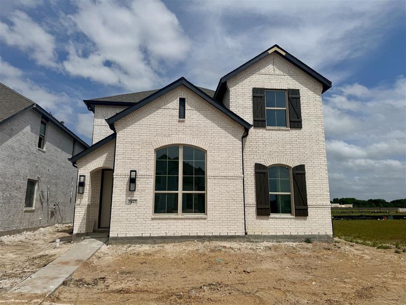 Front exterior of a new home in Pomona: 40ft. lots, Manvel, TX, highlighting curb appeal (Image 1). Front exterior of a new home in Pomona: 40ft. lots, Manvel, TX, highlighting curb appeal (Image 1).