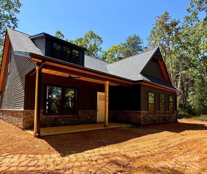 Front exterior of a new home in , Mount Gilead, NC, highlighting curb appeal (Image 9).