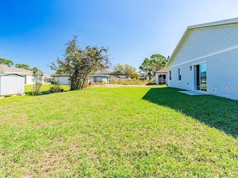 Front exterior of a new home in , Kissimmee, FL, highlighting curb appeal (Image 14). Front exterior of a new home in , Kissimmee, FL, highlighting curb appeal (Image 14).