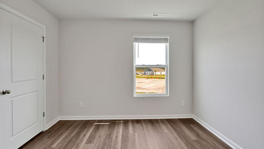 Representative unfurnished interior of a home built from the Hayden by D.R. Horton in Cedar Hill Landing, Navassa (Image 33).