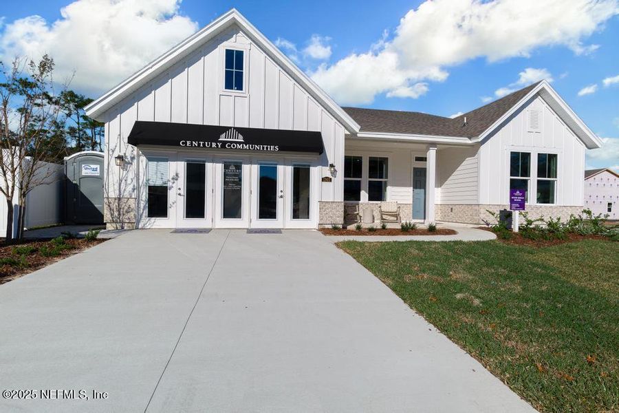 Front exterior of a new home in Oak Creek Preserve, Jacksonville, FL, highlighting curb appeal (Image 15). Front exterior of a new home in Oak Creek Preserve, Jacksonville, FL, highlighting curb appeal (Image 15).