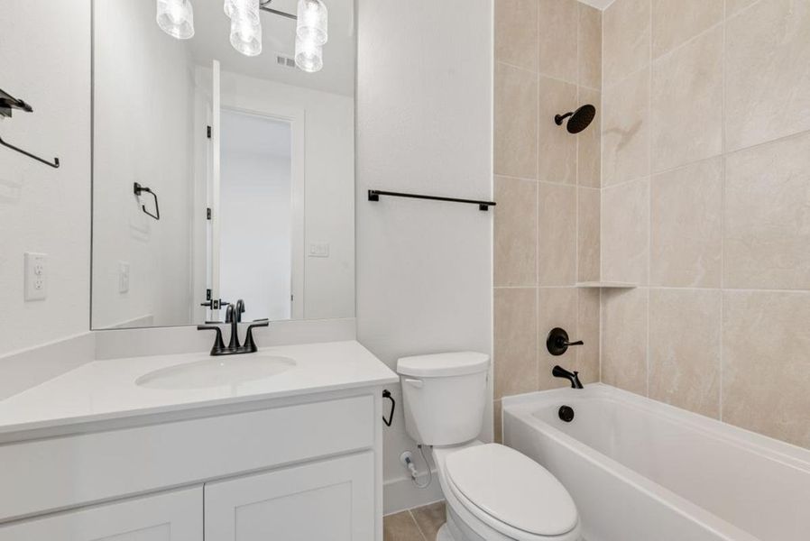 Representative furnished interior of a home built from the Grand Reserve by Grand Homes in Heath Golf & Yacht Club, Heath (Image 9).