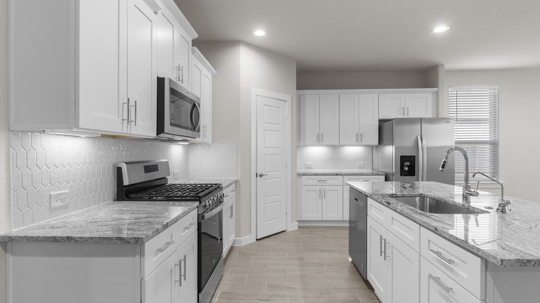 Representative furnished interior of a home built from the GLENWOOD by D.R. Horton in Northwest Passage, Midland (Image 4). Representative furnished interior of a home built from the GLENWOOD by D.R. Horton in Northwest Passage, Midland (Image 4).