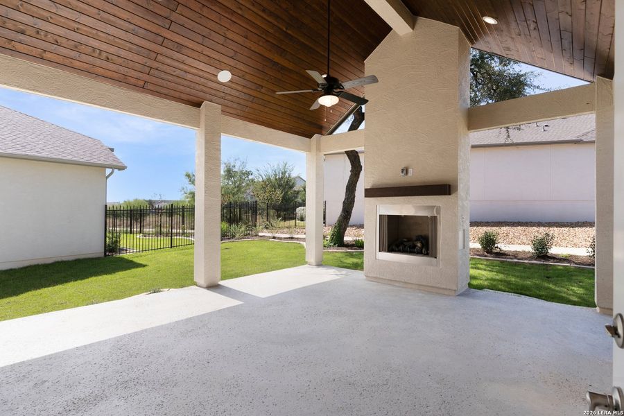 Exterior details and patio area of a home in El Sonido at Campanas, San Antonio (Image 21).