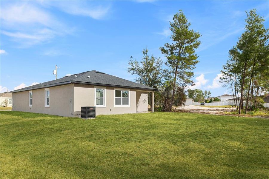 Exterior details and patio area of a home in , Poinciana (Image 3).