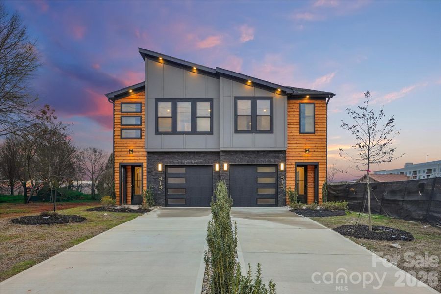 Front exterior of a new home in , Charlotte, NC, highlighting curb appeal (Image 25). Front exterior of a new home in , Charlotte, NC, highlighting curb appeal (Image 25).